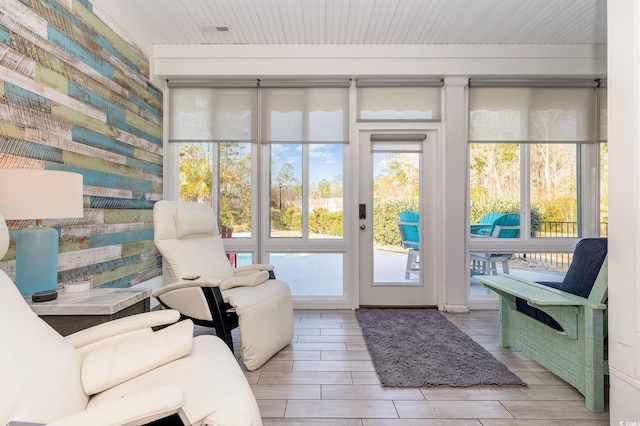 sunroom with wooden ceiling