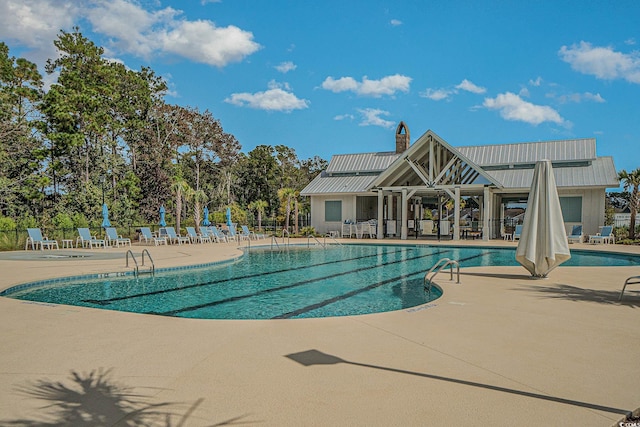 view of pool featuring a patio