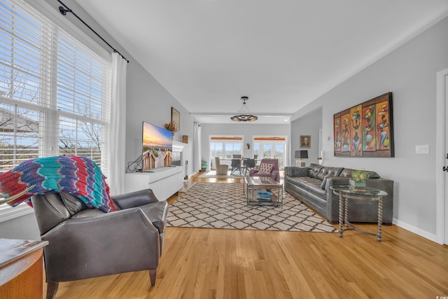 living room with light hardwood / wood-style floors