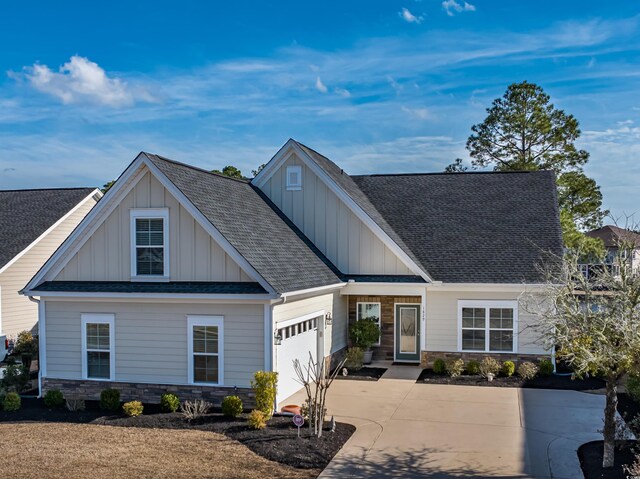 craftsman-style house featuring a garage