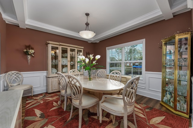 dining space with crown molding, dark hardwood / wood-style flooring, and beam ceiling