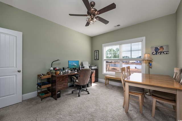 office space with ceiling fan and carpet flooring