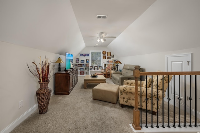 sitting room featuring ceiling fan, lofted ceiling, and carpet flooring