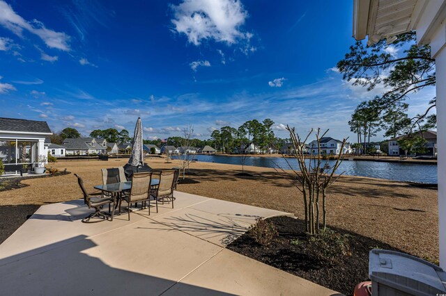 view of patio featuring a water view