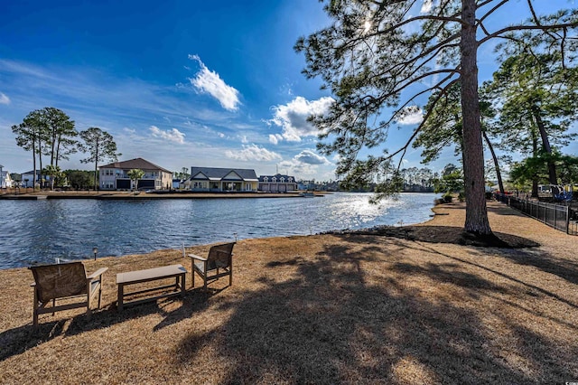 property view of water with a gazebo