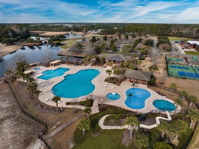 view of swimming pool with a water view