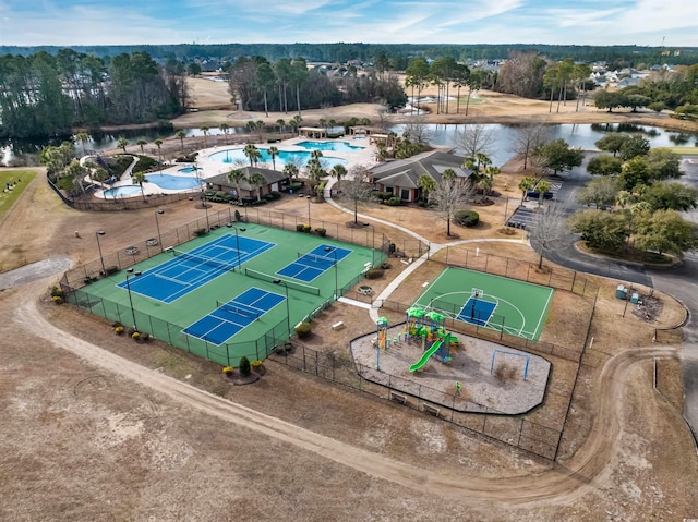 birds eye view of property featuring a water view