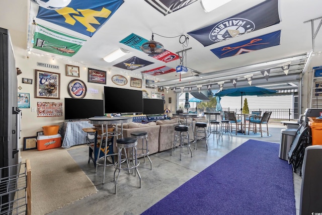 interior space featuring finished concrete flooring