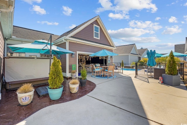 view of patio / terrace featuring outdoor dining space and fence