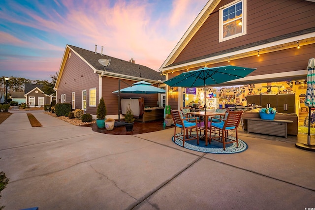 view of patio featuring outdoor dining area