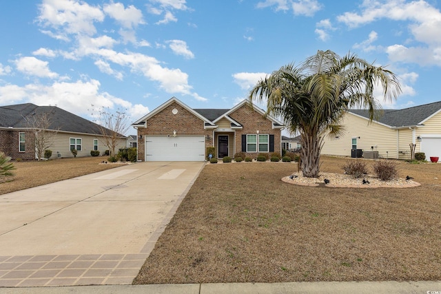 view of front of property featuring brick siding, a front lawn, concrete driveway, and a garage