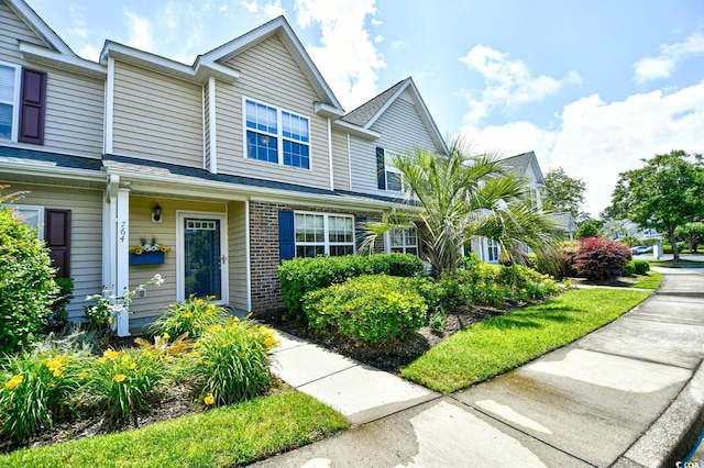 multi unit property featuring brick siding