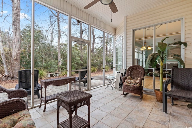 sunroom with ceiling fan