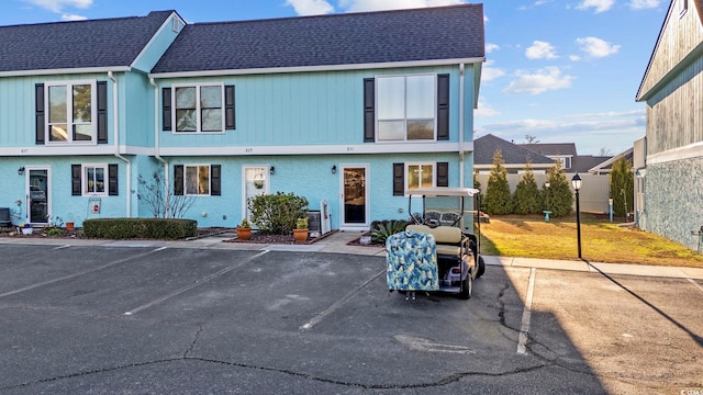 view of front of home with central air condition unit