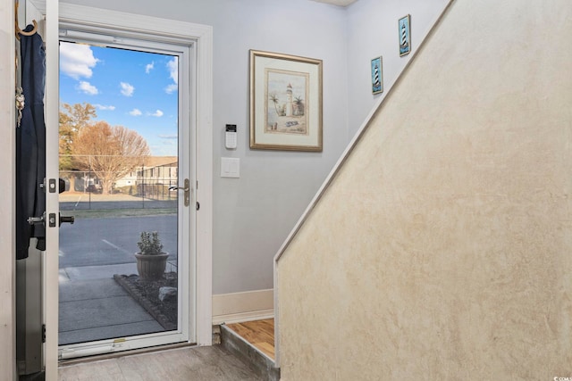 doorway featuring hardwood / wood-style flooring