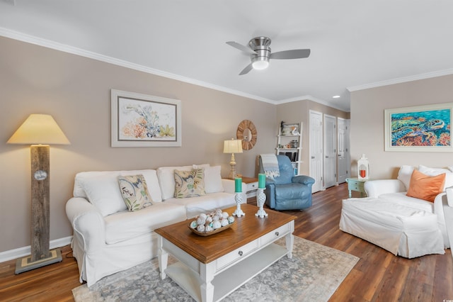 living room with dark wood-type flooring, ornamental molding, and ceiling fan