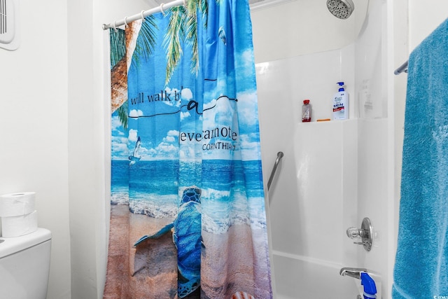 bathroom featuring shower / tub combo with curtain and toilet