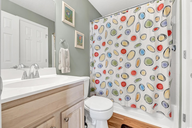 full bathroom featuring vanity, toilet, and shower / bath combo with shower curtain