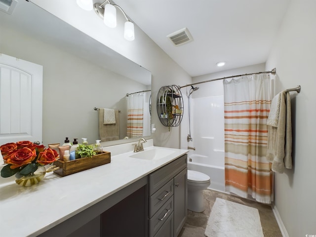 bathroom featuring visible vents, shower / tub combo with curtain, vanity, and toilet