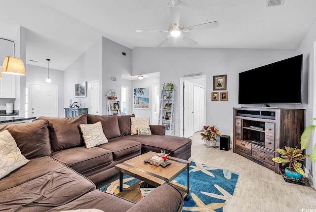 living room with ceiling fan, high vaulted ceiling, and light hardwood / wood-style floors