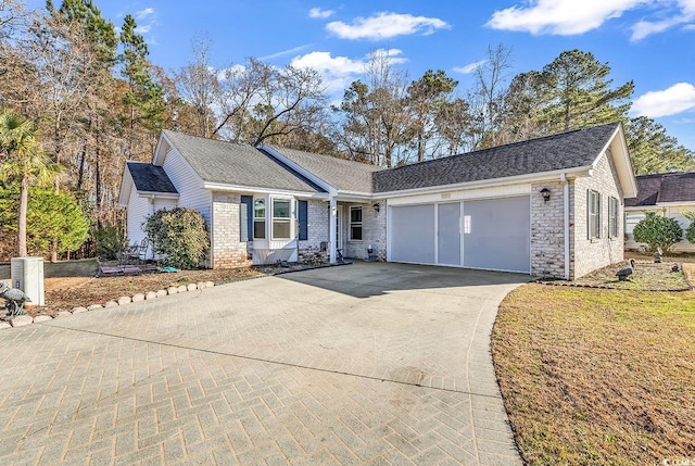 ranch-style home with a garage