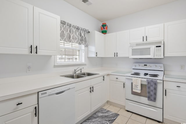5825 Catalina Dr Unit 332, North Myrtle Beach, SC 29582 - kitchen featuring white appliances, white cabinets, and light countertops