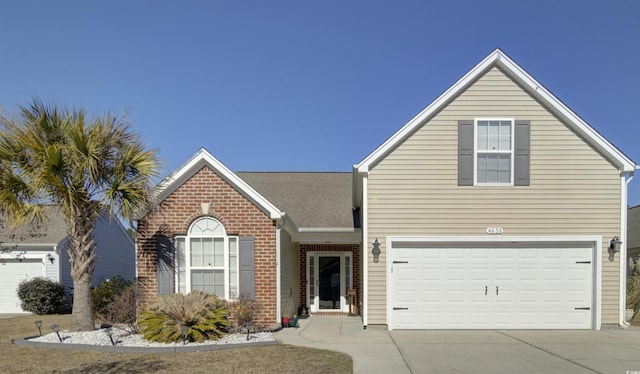 front of property with a garage