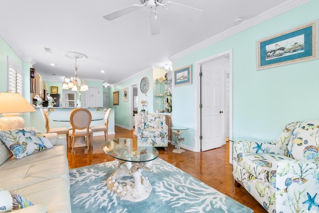 living room with ceiling fan with notable chandelier, parquet flooring, and ornamental molding