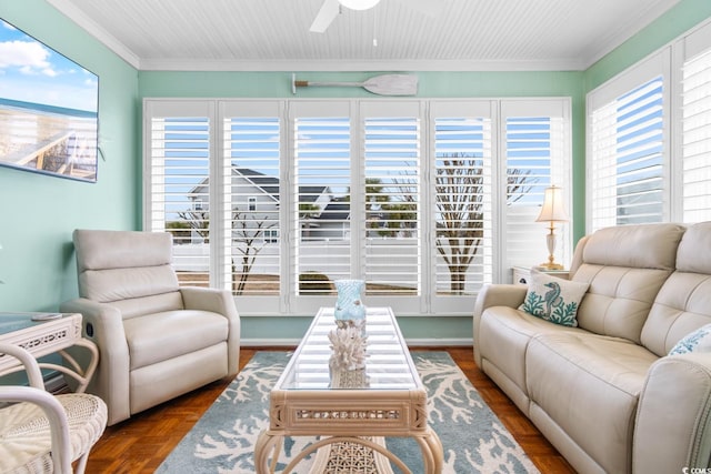 sunroom / solarium with ceiling fan