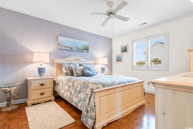 bedroom featuring dark parquet floors and ceiling fan