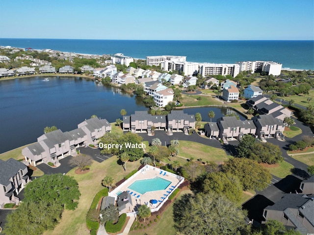 birds eye view of property featuring a water view