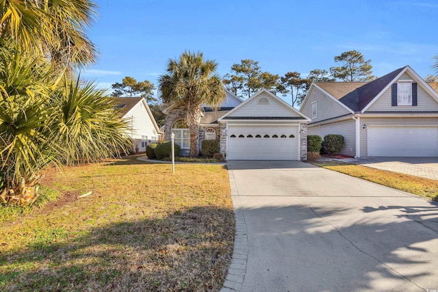 view of front facade featuring a garage and a front yard