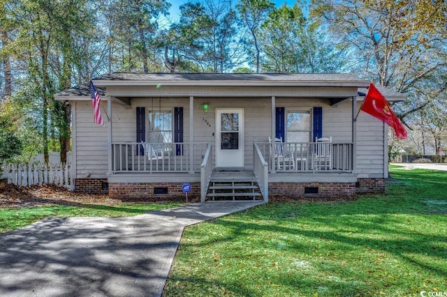 view of front of house featuring a front lawn and a porch