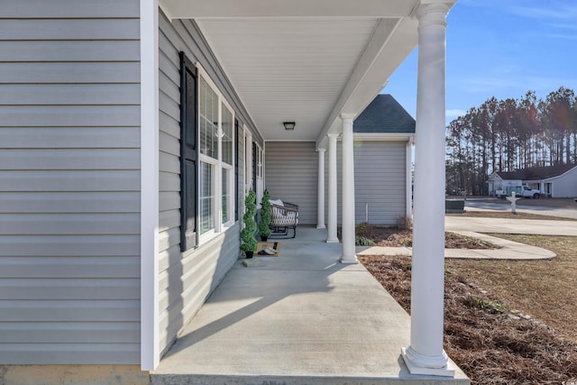 view of patio featuring a porch