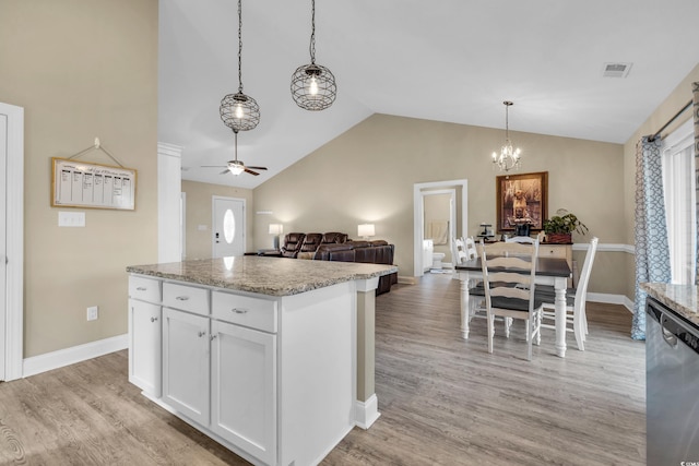 kitchen featuring visible vents, light wood-style floors, dishwasher, ceiling fan with notable chandelier, and open floor plan