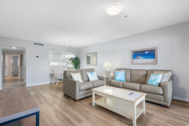 108 Rothbury Cir Unit 207, Myrtle Beach, SC 29572 - living area with baseboards and light wood-style floors