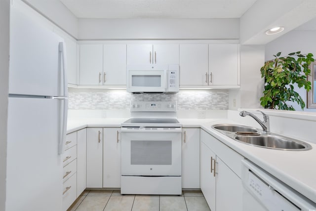 108 Rothbury Cir Unit 207, Myrtle Beach, SC 29572 - kitchen with white appliances, a sink, light tile patterned flooring, and white cabinets
