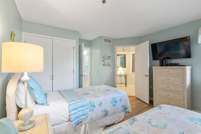 108 Rothbury Cir Unit 207, Myrtle Beach, SC 29572 - bedroom featuring a closet and wood finished floors