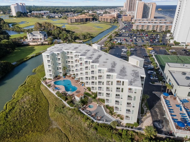 birds eye view of property featuring a water view