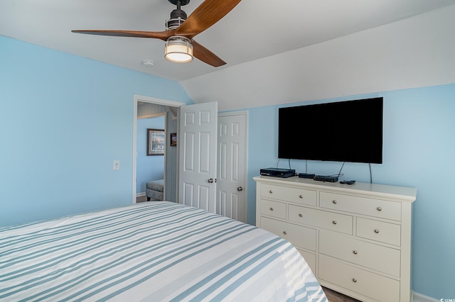 bedroom with ceiling fan and vaulted ceiling