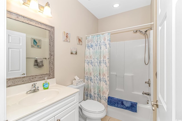 full bathroom featuring vanity, shower / tub combo, and toilet