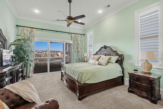 carpeted bedroom with ceiling fan, ornamental molding, and access to outside