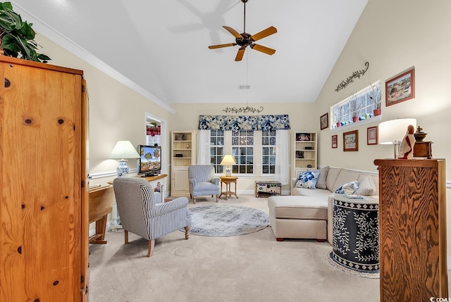 sitting room featuring carpet, high vaulted ceiling, a ceiling fan, and ornamental molding