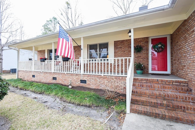 view of front of property featuring central AC and covered porch