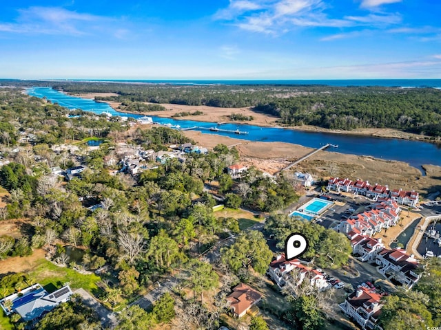 4396 Baldwin Ave Unit 94, Little River, SC 29566 - aerial view of property and surrounding area featuring a nearby body of water and a forest
