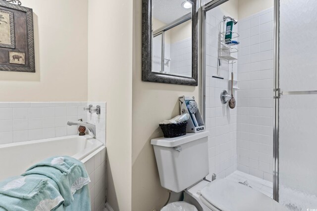 4396 Baldwin Ave Unit 94, Little River, SC 29566 - full bathroom featuring toilet, a tile shower, and a bath