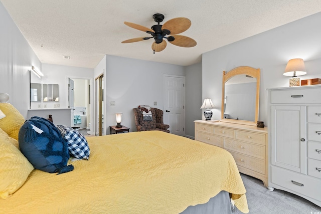 4396 Baldwin Ave Unit 94, Little River, SC 29566 - bedroom with light carpet, a ceiling fan, a textured ceiling, and ensuite bath