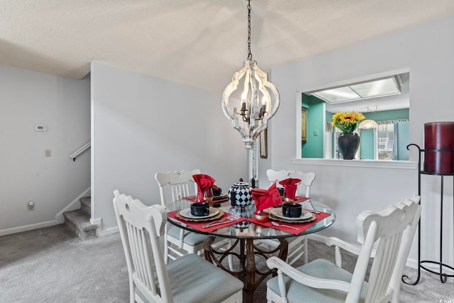 4396 Baldwin Ave Unit 94, Little River, SC 29566 - dining area featuring carpet flooring, a chandelier, baseboards, stairway, and a textured ceiling