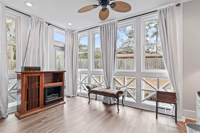 4396 Baldwin Ave Unit 94, Little River, SC 29566 - sitting room with plenty of natural light, ceiling fan, wood finished floors, a textured ceiling, and recessed lighting