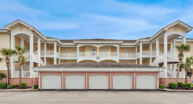 view of property featuring community garages